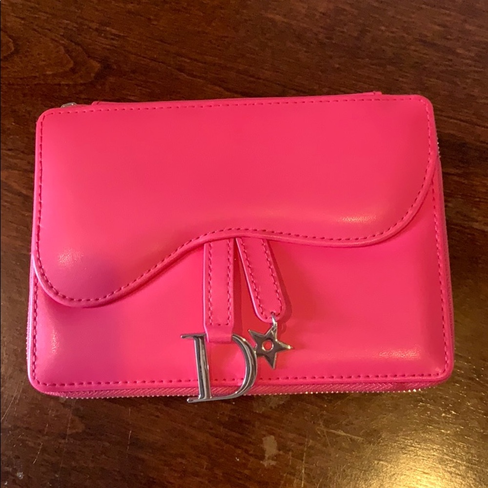 Hot pink Dior clutch